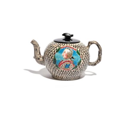 A salt-glazed stoneware teapot with associated cover  c.1755, the globular body brightly painted with a portrait of the King 