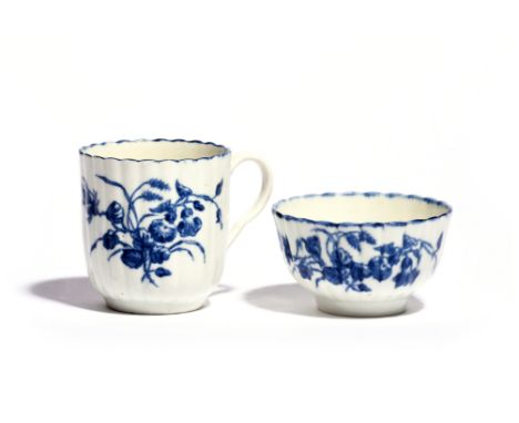 A Worcester blue and white teabowl and a coffee cup  c.1775-80, the reeded forms painted with the Wildflower Sprays pattern, 