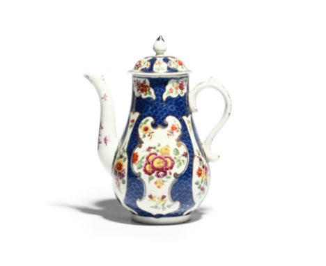 A Worcester coffee pot and cover  c.1765, the baluster shape painted with panels of flowers reserved within gilt C scroll bor