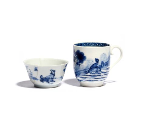 A rare Worcester blue and white coffee cup c.1760-65, painted with the Blue Valentine pattern with two dogs in the foreground