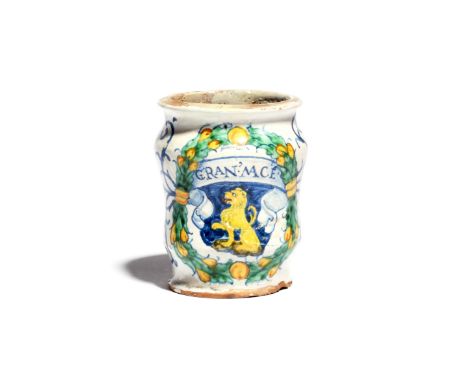 A small Italian maiolica albarello   dated 1560, possibly Montelupo, the waisted form painted with a yellow lion beneath a ri