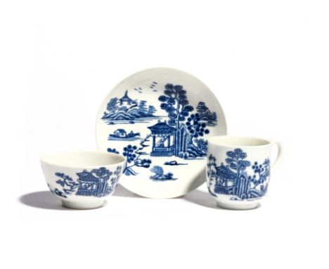 A Worcester blue and white trio  c.1775, comprising a coffee cup, teabowl and saucer, printed with the Man in the Pavilion pa