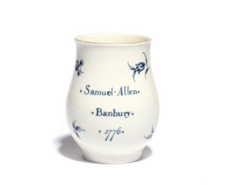 A documentary Worcester blue and white mug dated 1776, the baluster form painted with the Gilliflower and Narcissus sprays, f