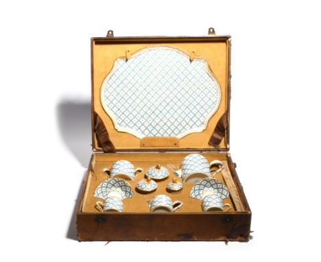 A Sèvres-style cabaret set  19th century, richly decorated with a trellis leaf design in turquoise, puce and gilt, enclosing 