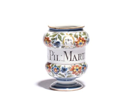 An Italian maiolica albarello or pill jar  c.1800, the small dumbbell form inscribed in manganese with 'Mas: Pil: Martial: Ca