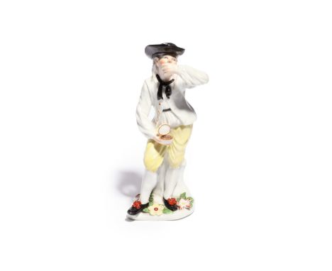 A Ludwigsburg figure of a snuff taker  c.1765-70, standing and raising a pinch to his nose with his left hand, from a small s
