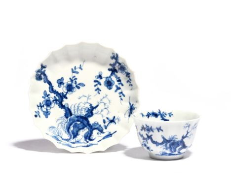 A Worcester blue and white teabowl and saucer  c.1758, the Warmstry fluted forms painted with the Prunus Root pattern, workma