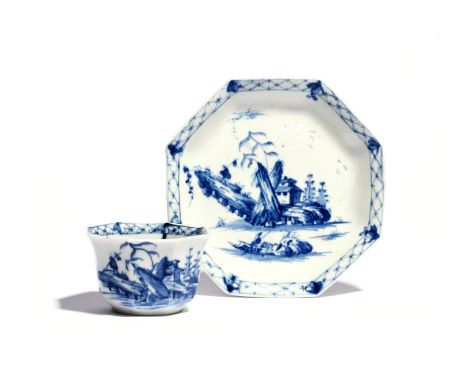 A Worcester blue and white octagonal teabowl and saucer  c.1756, painted with the Romantic Rocks pattern, a figure walking to