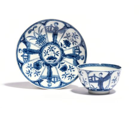 A Worcester blue and white small teabowl and saucer  c.1765-70, decorated with the Arcade pattern, with alternating petal sha