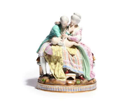 A Meissen family figure group of The Lucky Parents  19th century, modelled by Acier with a couple cooing over a baby reclinin