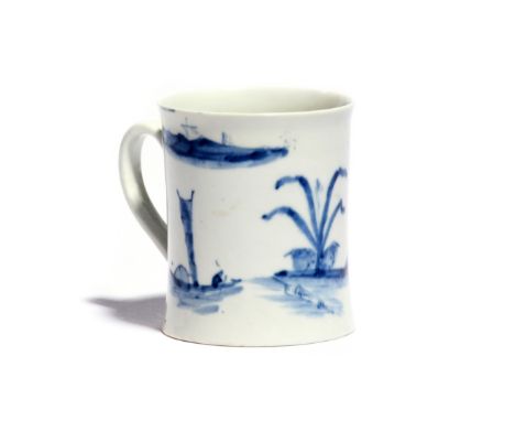 An early Worcester blue and white small mug c.1753-54, the slightly waisted form painted with the Willow Root pattern, the sp