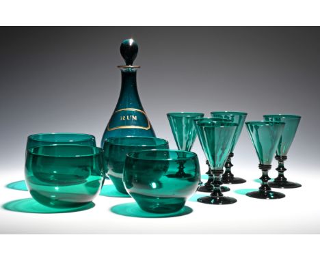 Six green wine glasses  c.1800, with flared bowls raised on knopped and collared stems, a green glass Rum decanter and stoppe