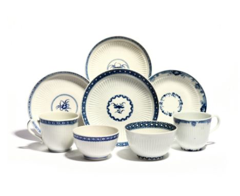 Two Worcester blue and white teabowls and saucers and two coffee cups and saucers  c.1765-75, all moulded with wide bands of 