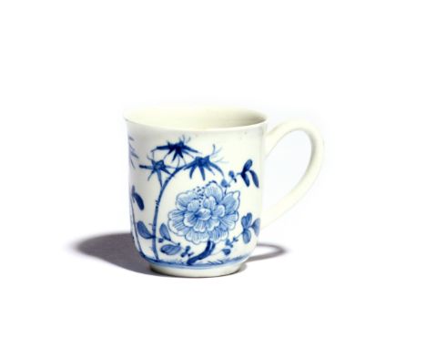 A rare Worcester Scratch Cross blue and white coffee cup c.1754, the rounded form with everted rim, painted with the Bamboo P