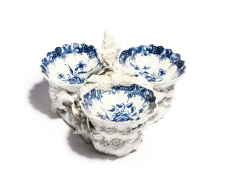 A Worcester blue and white sweetmeat stand or salt  c.1765, formed with three shell dishes raised on a shell-encrusted rocky 