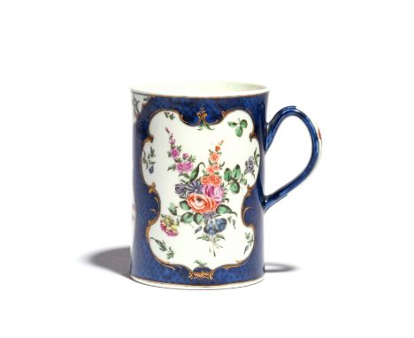 A large Worcester porter mug  c.1765-75, the cylindrical body painted with large panels of flowers and smaller panels of spri