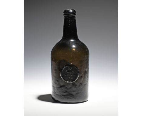 A sealed wine bottle dated 1810, the squat mallet form with string rim and kick-in base, applied with a seal inscribed 'R Shu