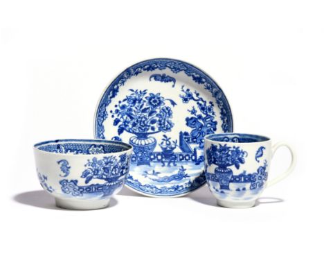 A Worcester blue and white trio c.1770-80, comprising a coffee cup, teabowl and saucer, printed in the Bat pattern with the c