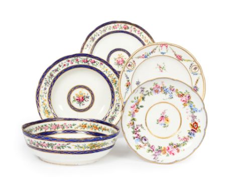 Four Sèvres plates (assiettes) and a bowl (compotier)  c.1760-92, the bowl, one plate and a soup plate painted with central f