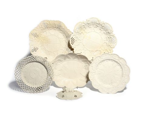 Five salt-glazed stoneware dishes  c.1750-70, the two larger moulded with varying diaper panels with pierced sections to the 
