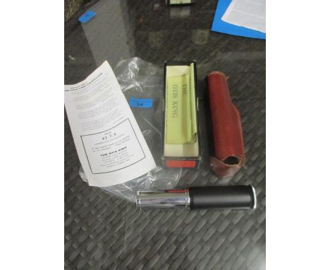 An Ottis King calculator/spiral slide rule, model K No. B6187 (No 1687 on box), with leather slip case, boxed with instructio