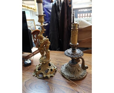 A 19th century Ormolu figural candlestick, converted to electricity, together with a carved gilt wood table lampLocation: 7:1