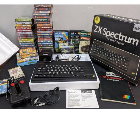 A ZX Sinclair Spectrum with manual, boxed games and a joystick, Location: LA2M 