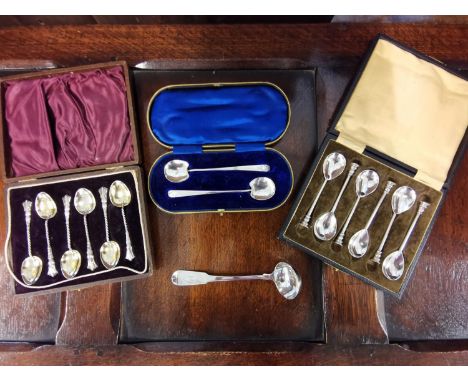 Silver to include a Georgian Scottish sauce ladle, two cased sets of six teaspoons, a cased pair of preserve spoons, 185gLoca