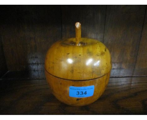 An early 20th century fruitwood tea caddy in the form of an apple Location: G 