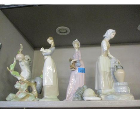 A Lladro squirrel on a tree, together with other Lladro models and a Nao figure A/F Location: 2.1 