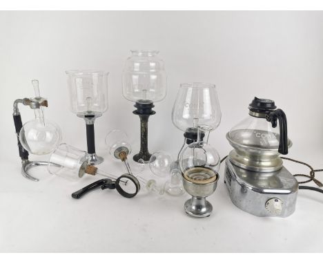 A vintage Cona coffee machine model FB103, with multiple spare glass parts, percolator, drainer sticks and stands 