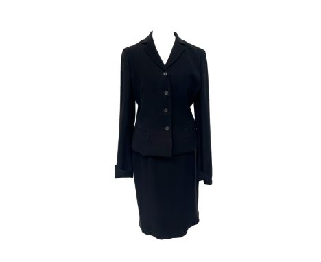 A Prada two piece skirt suit, below knee pencil skirt with single vent to back, side zip closure, a fitted single breasted ja