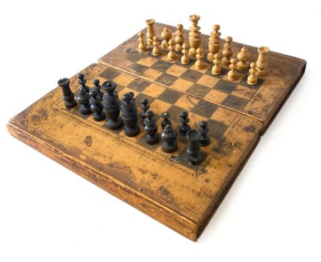 A 19th century folding chess and backgammon board with leather interior