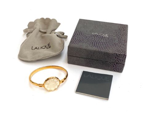 A Lalique Bijoux 'Fleur' crystal and gold plated bangle in original box