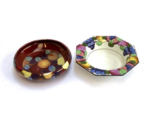 Charlotte Rhead Bursley ware bowl no73 c1921 with fruits and leaves outlined in gilt on red lustre ground, 24cmD; together wi