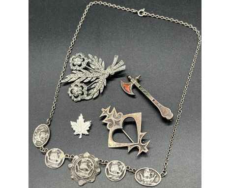 A Collection of silver jewellery to include Viking longboat themed necklace, silver and agate axe brooch, Edinburgh silver Ce