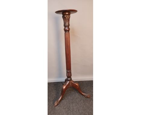19th century torcher stand, with carved foliate design to the column, raised on a tripod base  [112cm high] 