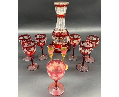 A Lot of 19th century etched ruby glass wine glasses, cranberry etched glass, two ruby and gold painted glasses and large ant