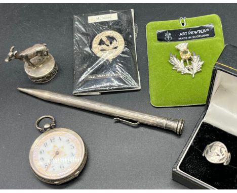 A Selection of silver hallmarked items and pewter brooch. The Lot Includes 935 Swiss silver fob pocket watch, Silver Longboat