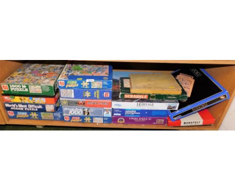 Various puzzles, board games, etc., to include Monopoly, Scrabble, etc. (1 shelf)