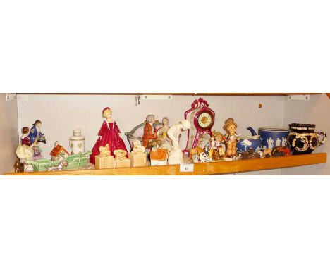 Royal Doulton figure of a girl on a rock, Hummel figures, Sylvac dog cruet set and other pottery
