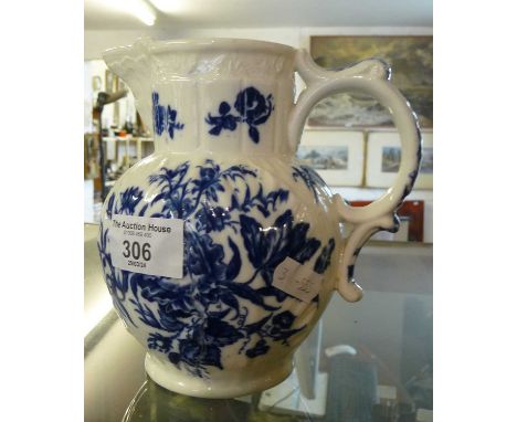 Worcester blue and white jug with floral and butterfly decoration, crescent mark, 15cm tall