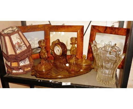 1930s amber glass dressing table set with clock, other glass and three prints