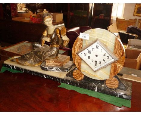 French Art Deco marble and onyx clock with lady figure. Approx. 65cm wide and 33cm high