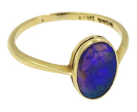 Gold single stone oval black opal ring, stamped 18ct, makers mark WG&amp;S 