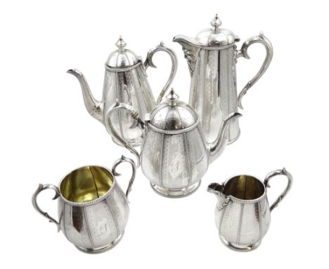 Victorian silver three piece tea service including teapot, sugar basin and milk jug, tapered baluster form, each panel with b