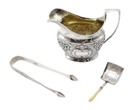 George III silver cream jug, embossed foliate decoration by Solomon Hougham, London 1805, silver caddy spoon with mother of p