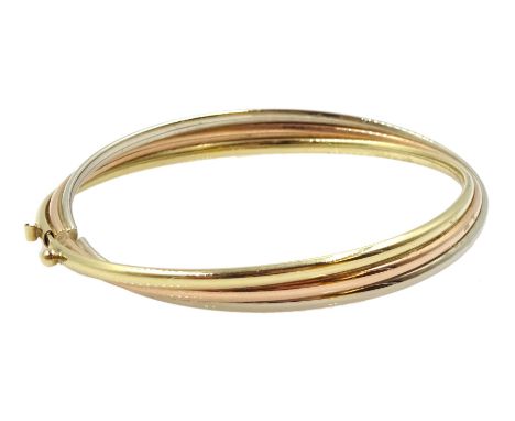 White, yellow and rose gold hinged bangle, stamped 10K approx 9gm