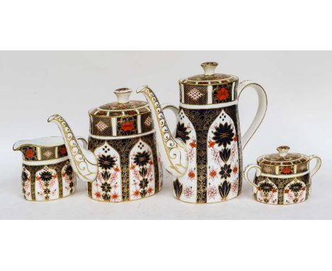 A Royal Crown Derby Imari teapot, coffee pot, milk jug and sucrier pattern 1128, printed marks, date codes for 1979/86, coffe