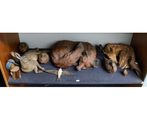 A collection of eleven ceramic figures by Karen Fawcett, including: a Fox, Fawn, Hare, Kingfisher, two little Owls, Thrush, S